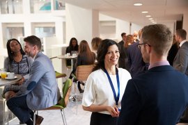 A group of traders networking at event