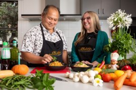 Emily Harnett with chef and trainer Prasit 'Oddie' Yukatirat in the kitchen.
