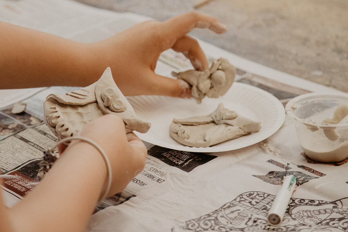 children doing pottery