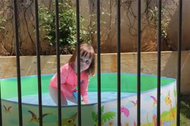 Relocatable pool with a safety barrier