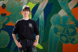 George Rose stands before her mural in Lupton Way, Boronia.