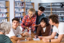 Young people around a table