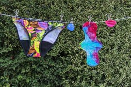 Reusable menstrual products hanging on a washing line