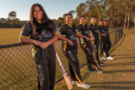 women on cricket field