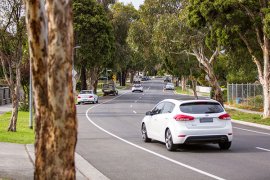 Car driving on road.