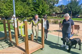 Vision imparied people at an outdoor playground