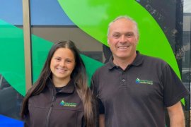 Two smiling staff members from Yellow Landscaping