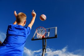 boy playing basketball