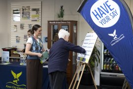 Person having their say at an engagement pop up