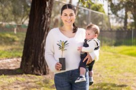 Daniella Cavello and baby Elijah receive a tree from Council at Wattleview Maternal and Child Health Centre in Ferntree Gully