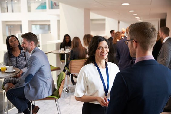 A group of traders networking at event