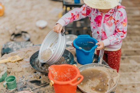 Child playing in a sandpit