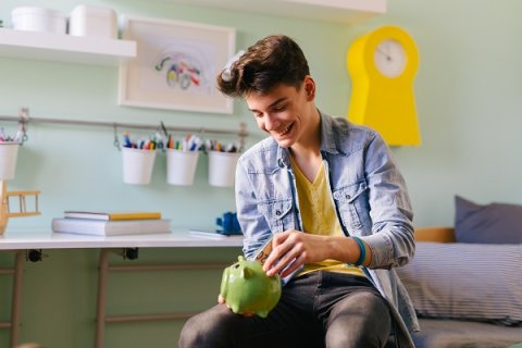 Young person with a money box