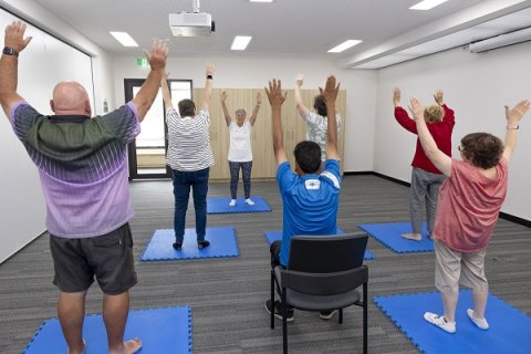 people doing an exercise class