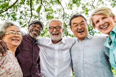 Five people linking arms