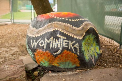 First Nations artwork stating wominjeka